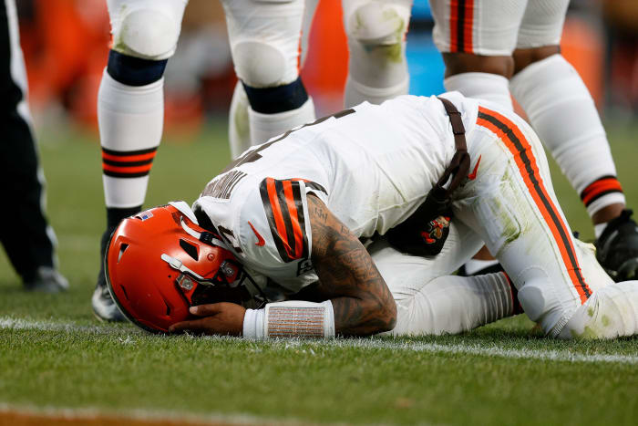 Nov 26, 2023; Denver, Colorado, USA; Cleveland Browns quarterback Dorian Thompson-Robinson (17) reacts after being hit in the third quarter against the Denver Broncos at Empower Field at Mile High.
